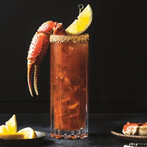 drink with lobster claw and lemon