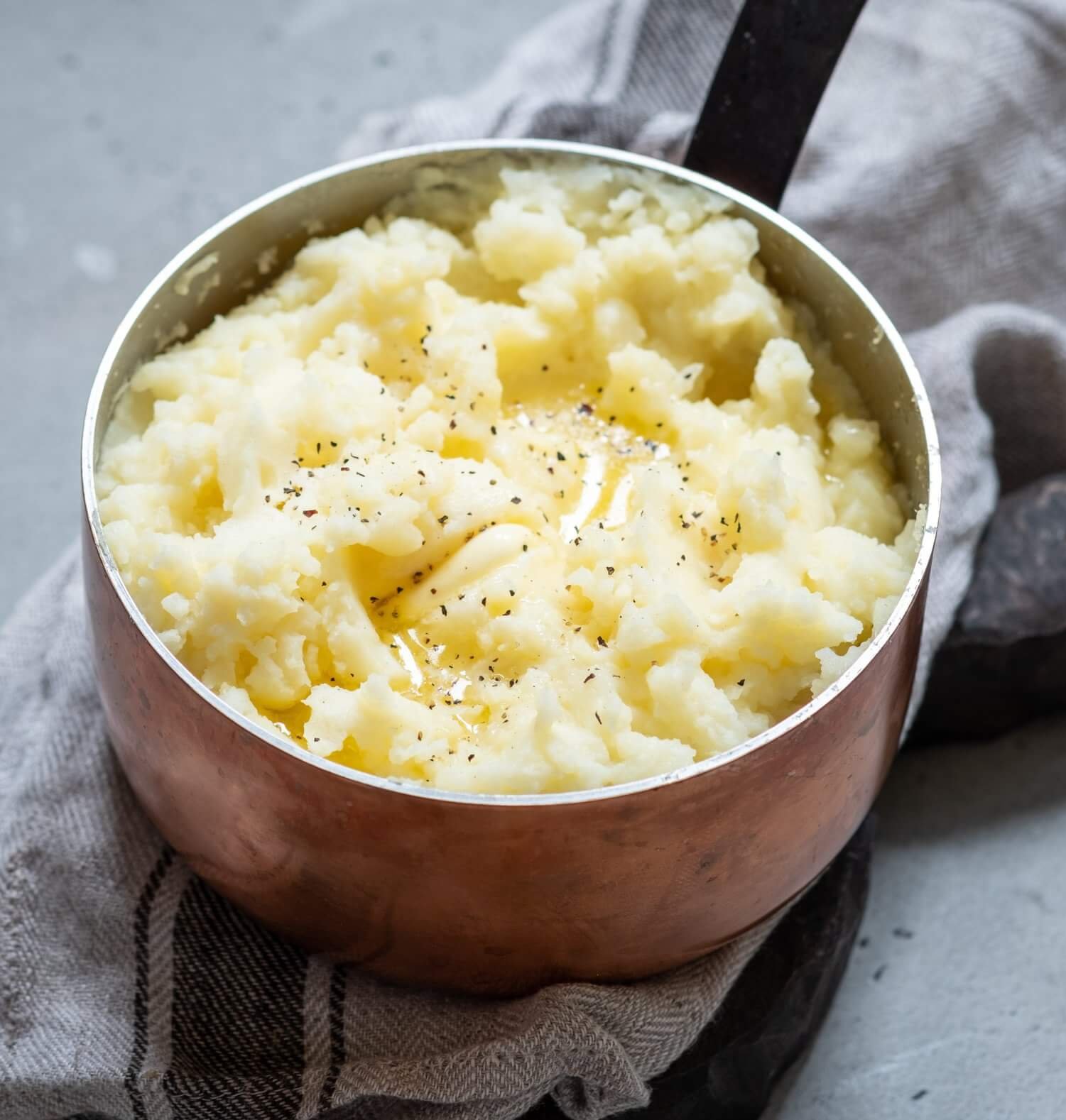 copper pot with mashed potatoes