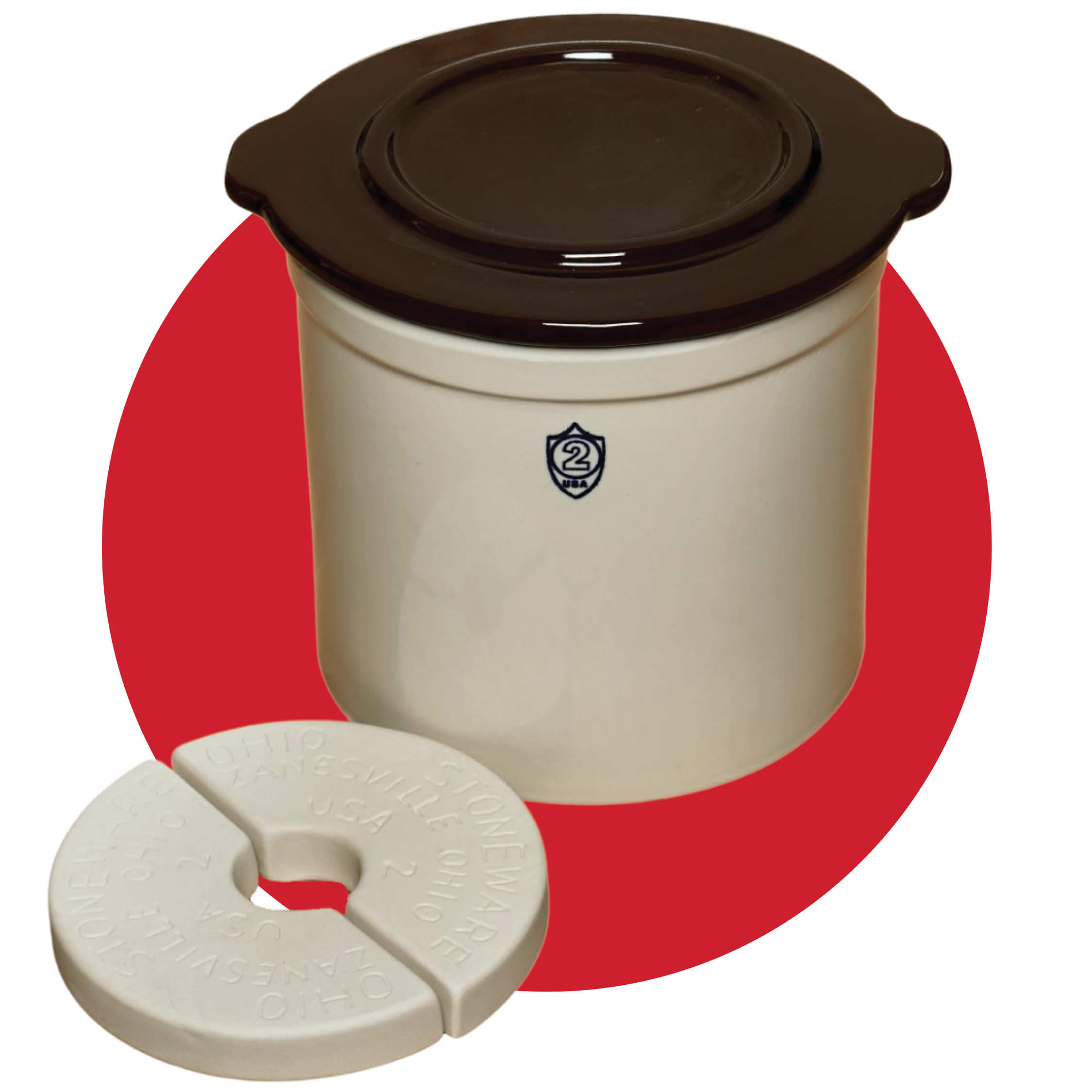 A crock set and two weights on a red circle