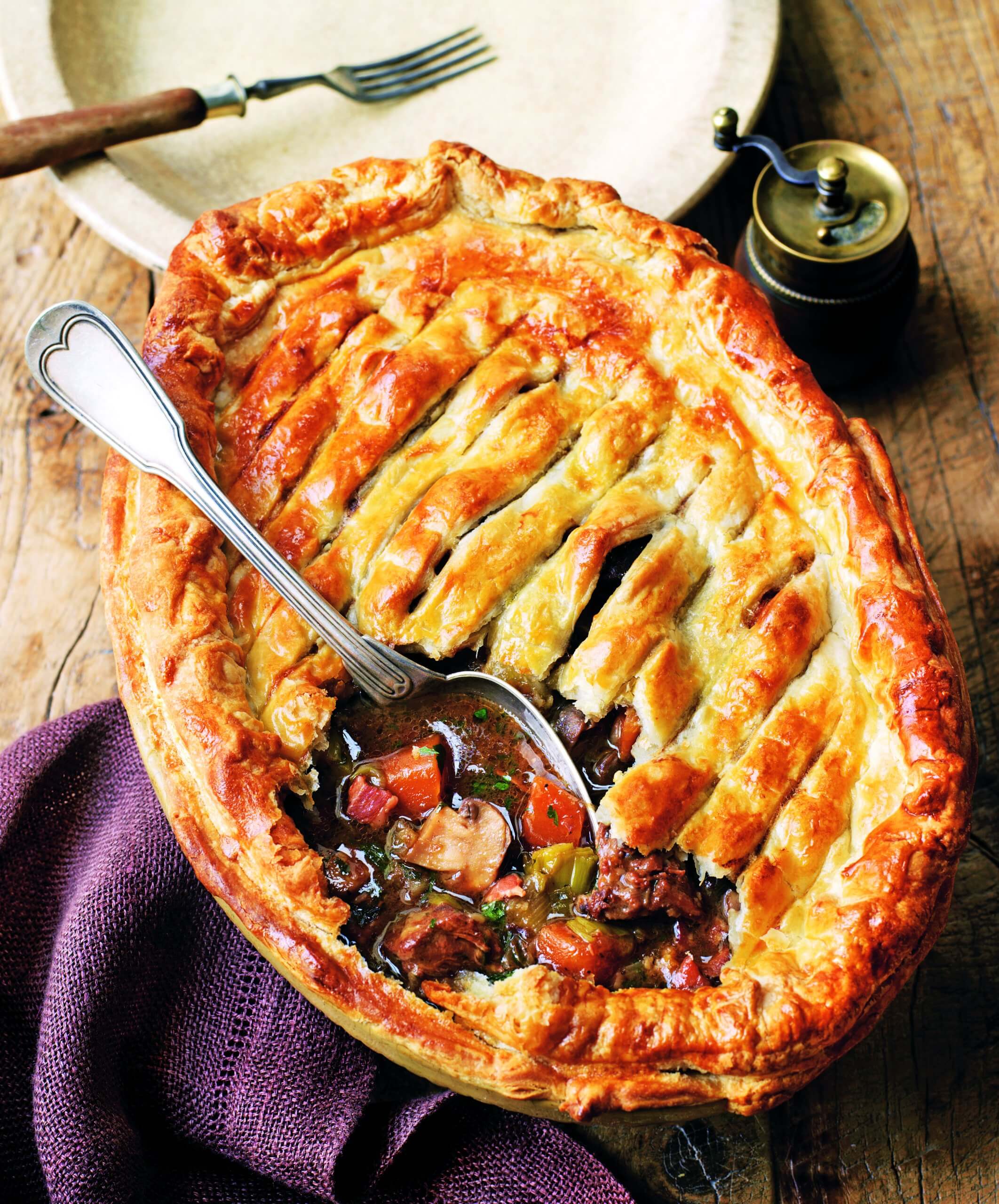 oval pie with spoon