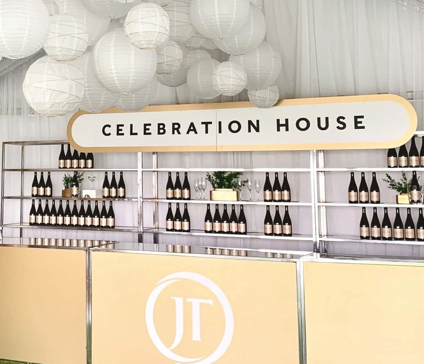 Jackson Triggs Niagara Estates has an outdoor bar in a white tent with lanterns