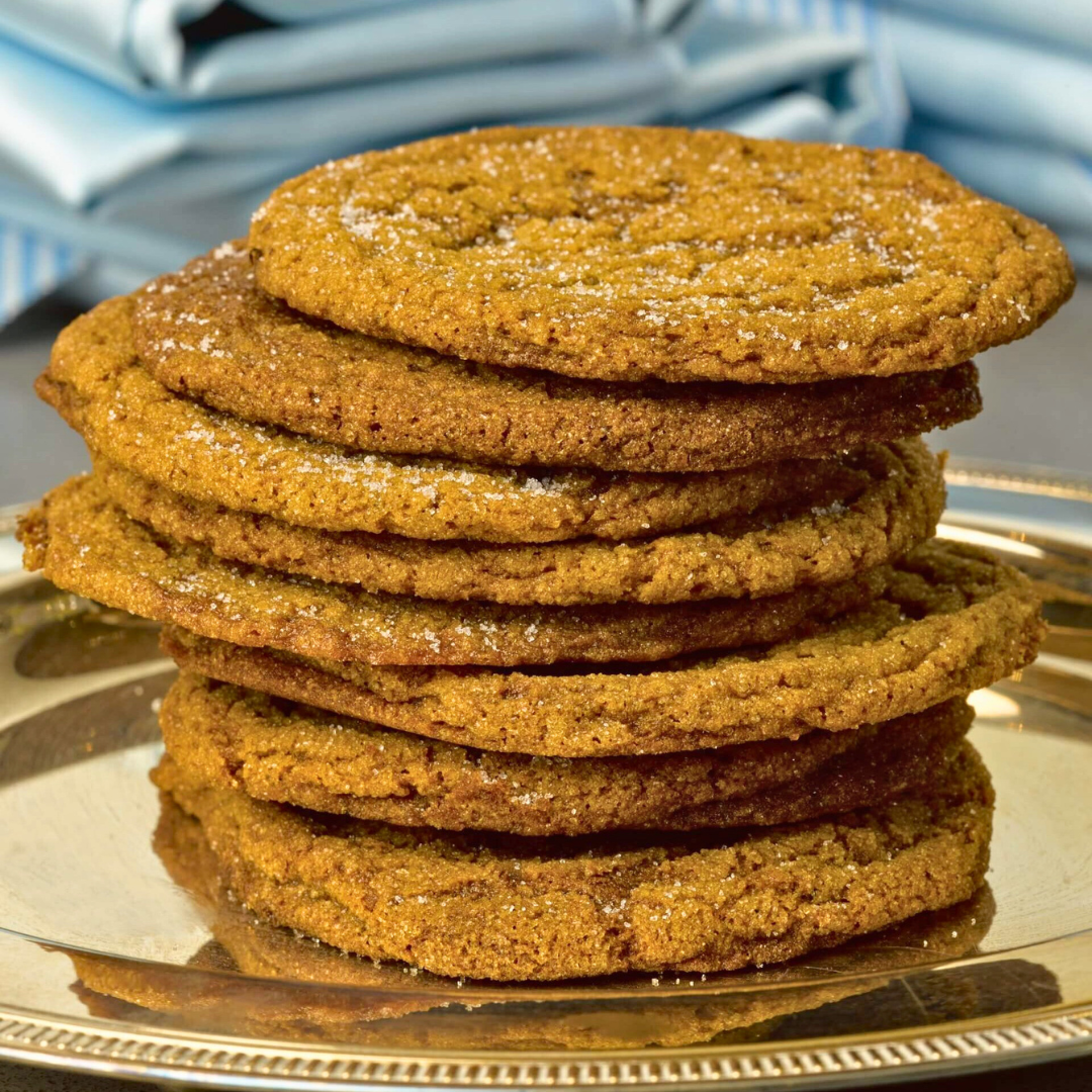 Chewy ginger molasses cookies made with real grated ginger, warm spices, and a sprinkle of sea salt—perfect for holiday baking and gifting.