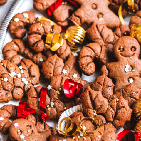 A closeup of many gingerbread men cookies