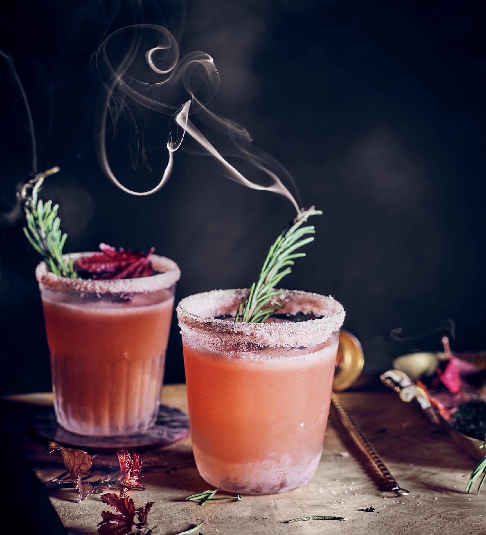 two glasses with smoky cocktail