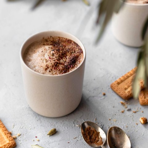 mug with chai tea topped with cinnamon