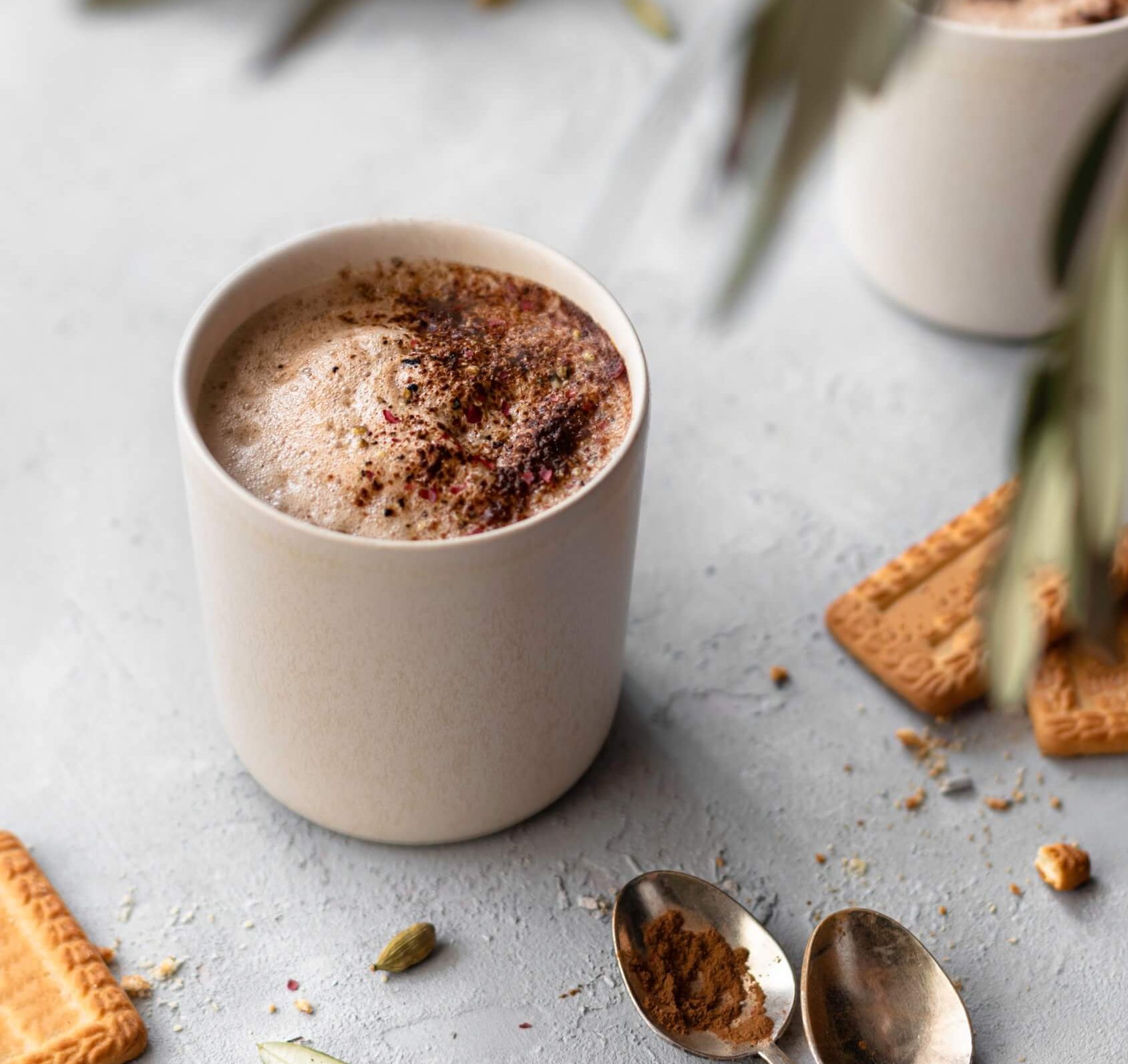 mug with chai tea topped with cinnamon