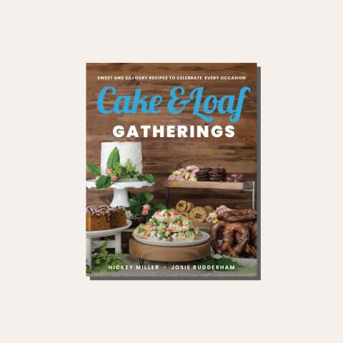 A cookbook cover in a pale frame.