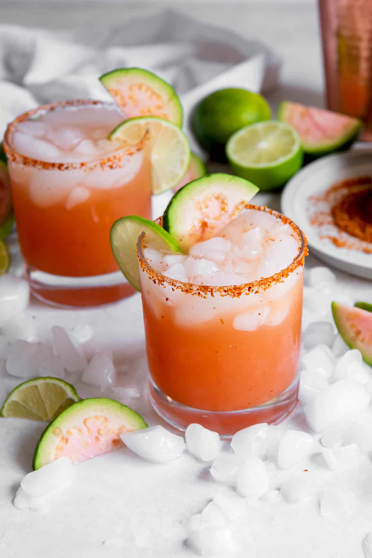 Margaritas with ice and guava as garnish and styling.