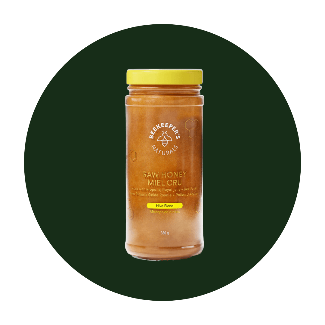 A jar of honey on a dark green circle