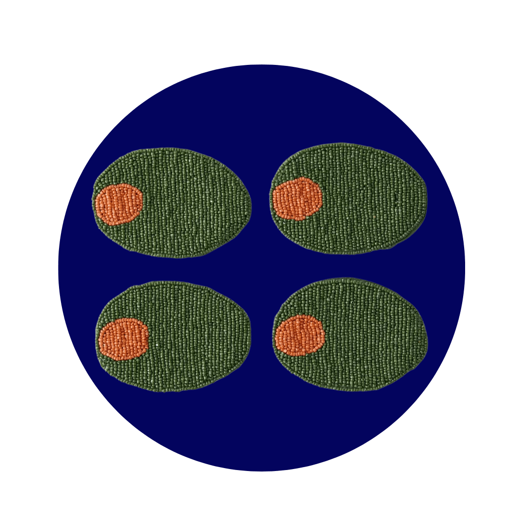Four beaded coasters modelled after cocktail olives on a dark blue circle graphic