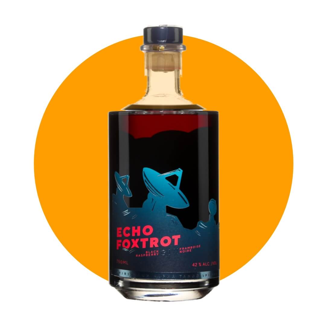 A bottle of red liqueur on an orange circle graphic