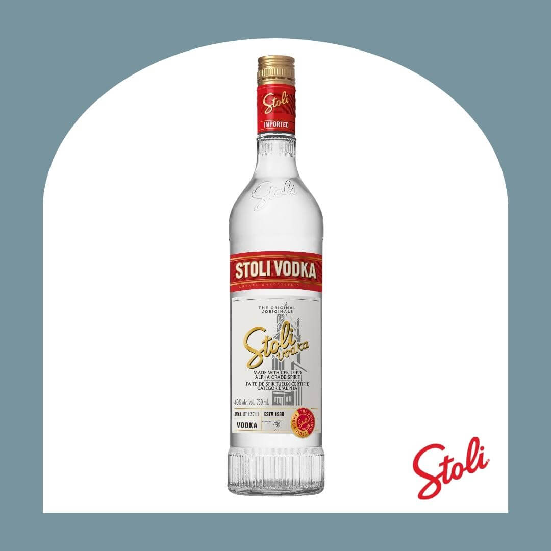 A bottle of vodka with a red label in a steel blue arch-shaped frame