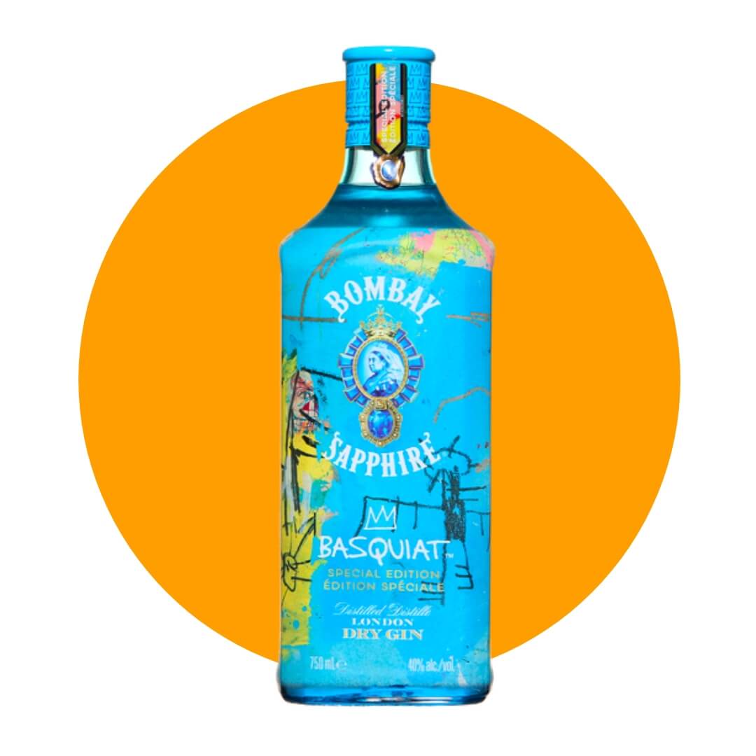 A blue bottle of Bombay Sapphire with abstract artwork on an orange circle graphic