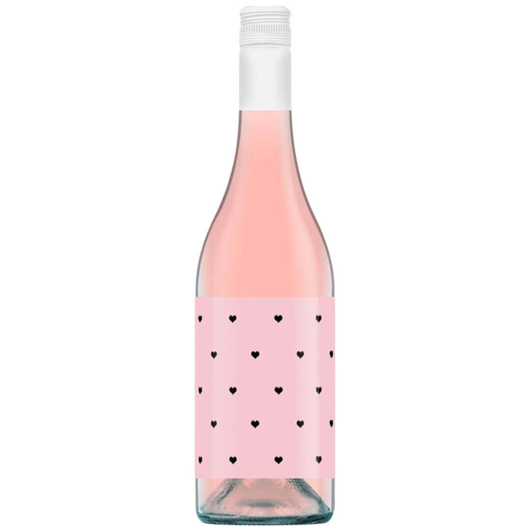 A bottle of rose wine with a white cap and pink label with a pattern of small black hearts