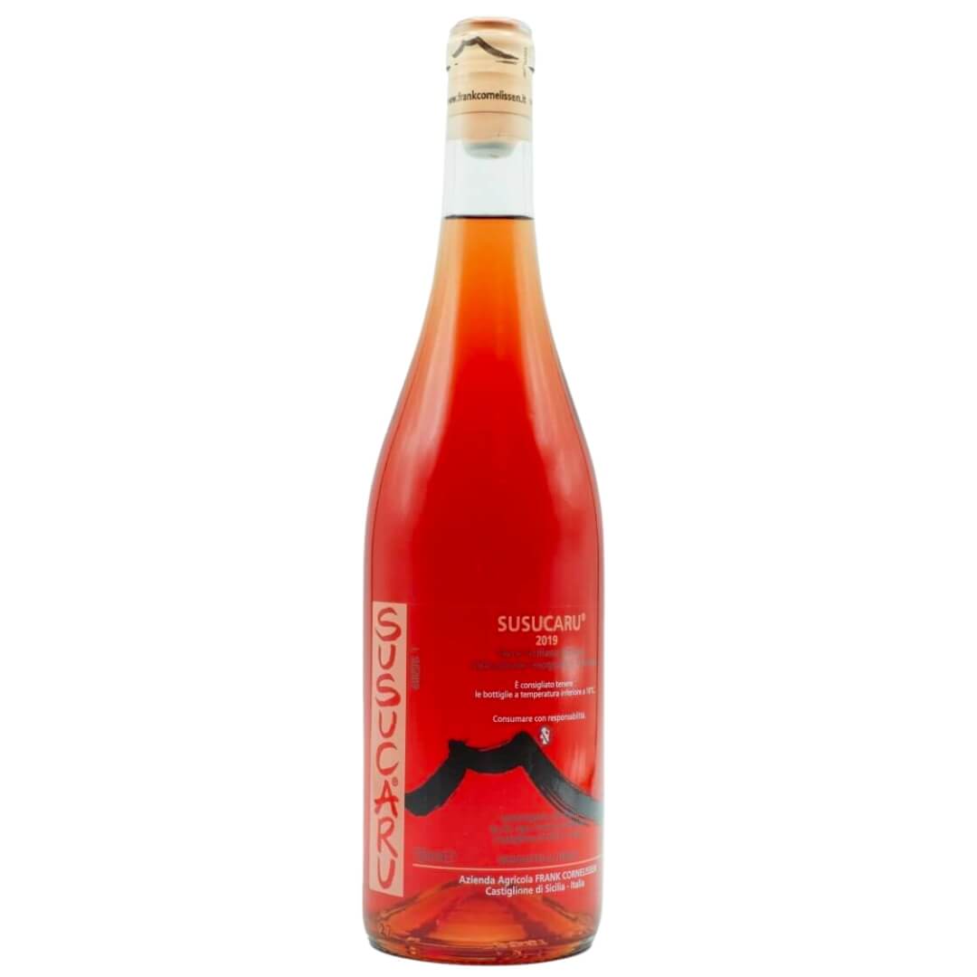 A bottle of rose wine with a clear label and white and black lettering