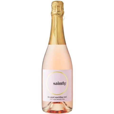 A bottle of light rosé qine with gold foil and a simplistic label