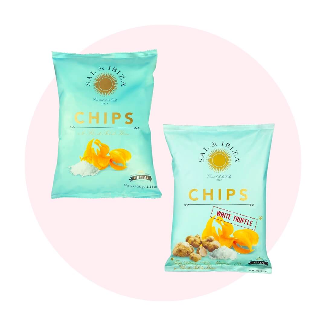 Two blue bags of chips on a pale pink circle graphic