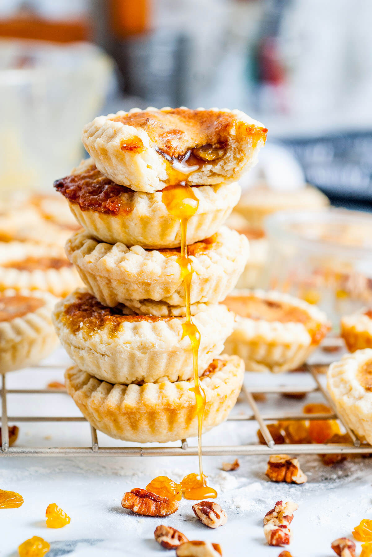 A stack of butter tarts on a drying rack