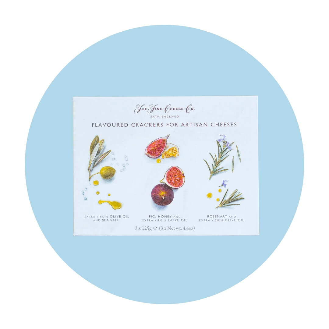 A white box with painted herbs and figs on a blue circle graphic