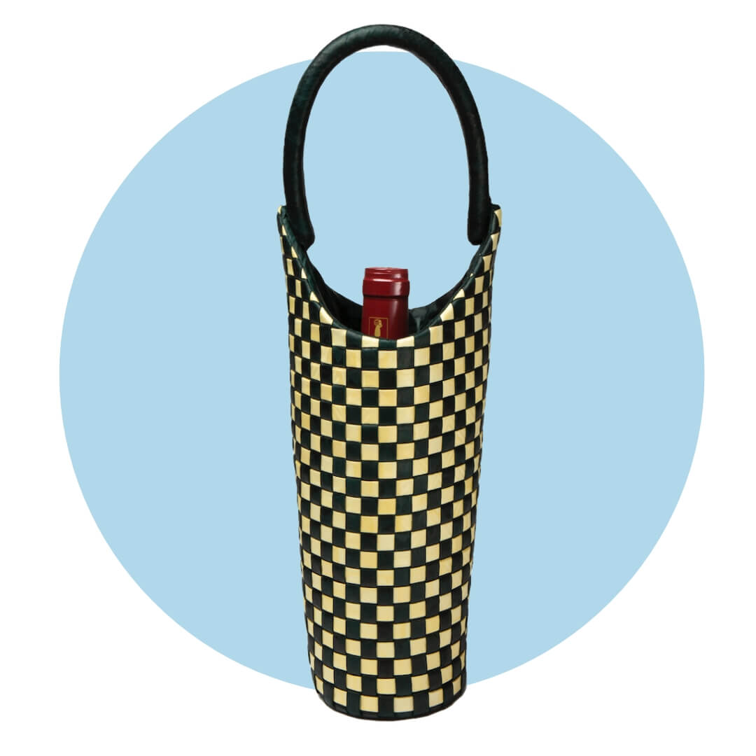 A black-and-yellow weave wine bottle bag with a red cap visible on a light blue circle graphic