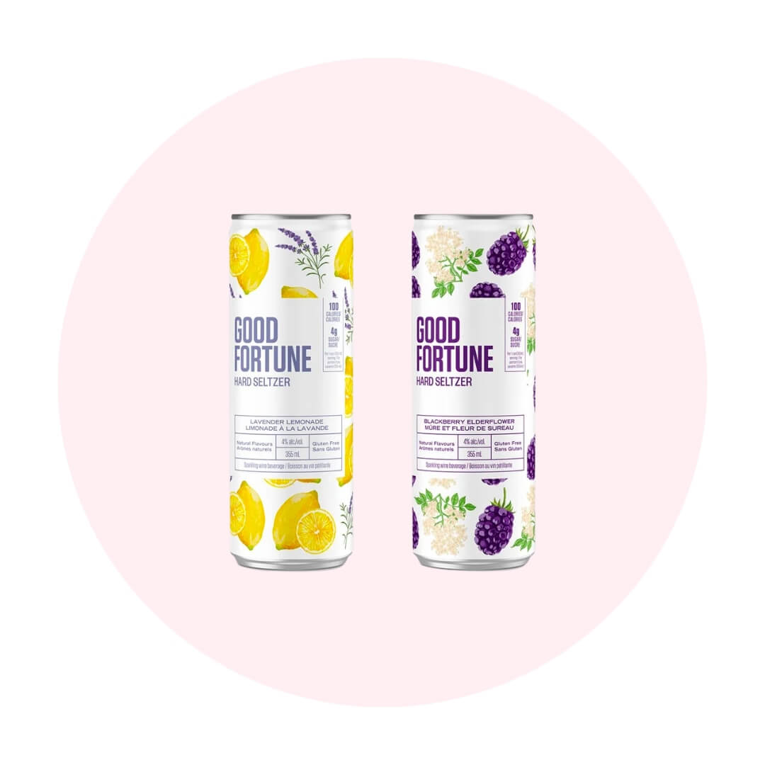 A yellow-and-white can and a purple-and-white cans on a light pink circle graphic