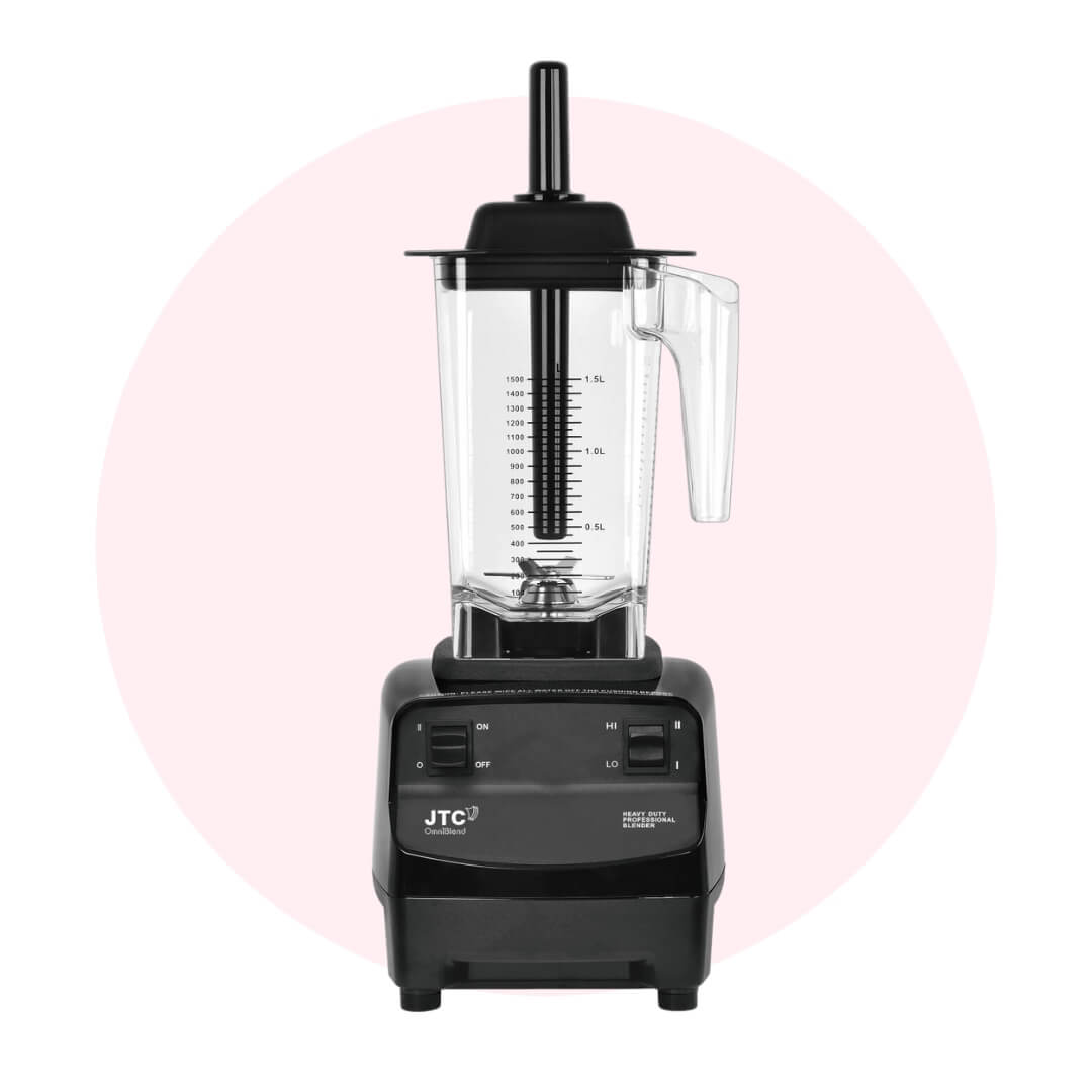 A black blender over a pale pink circle graphic
