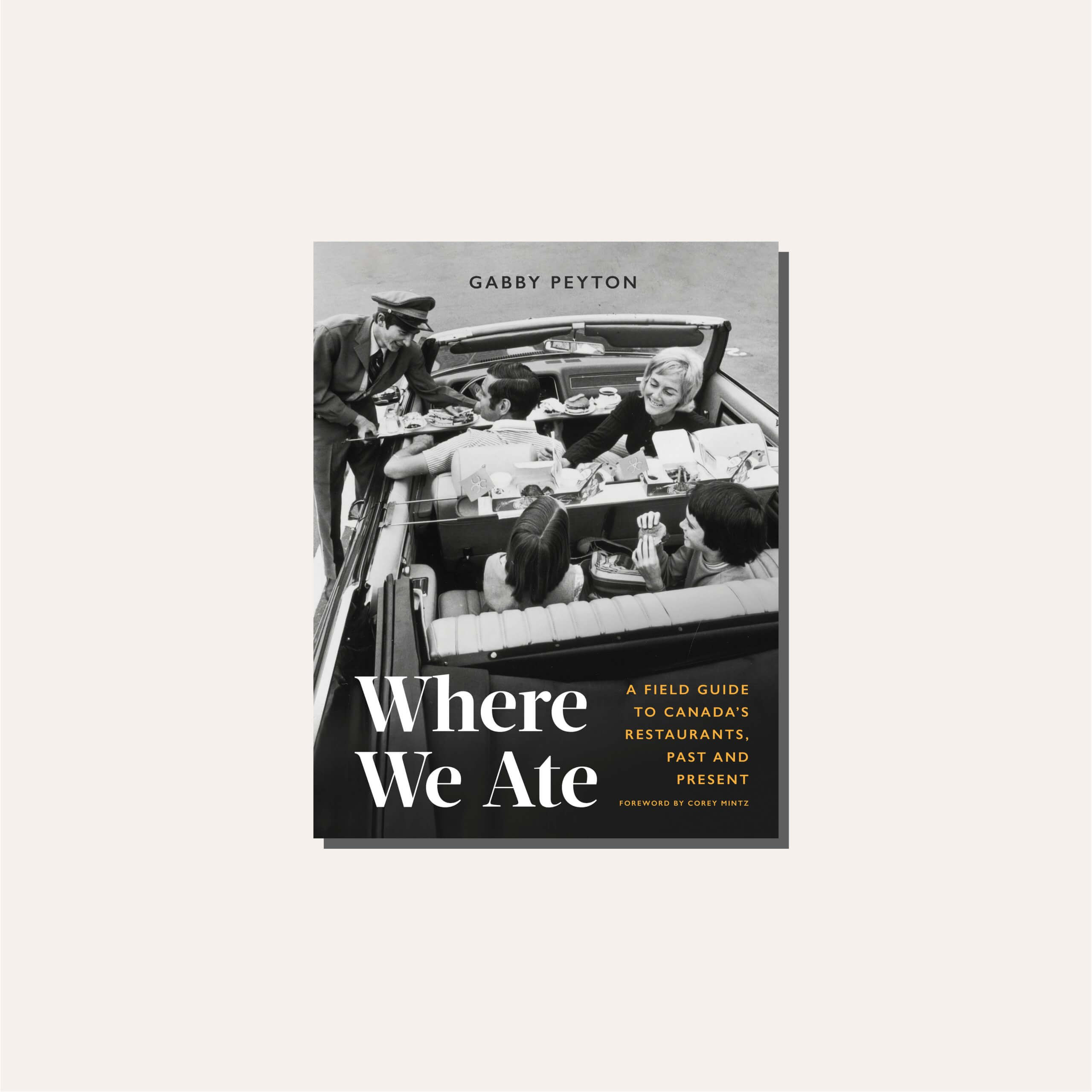 A black-and-white book cover in a light tan frame