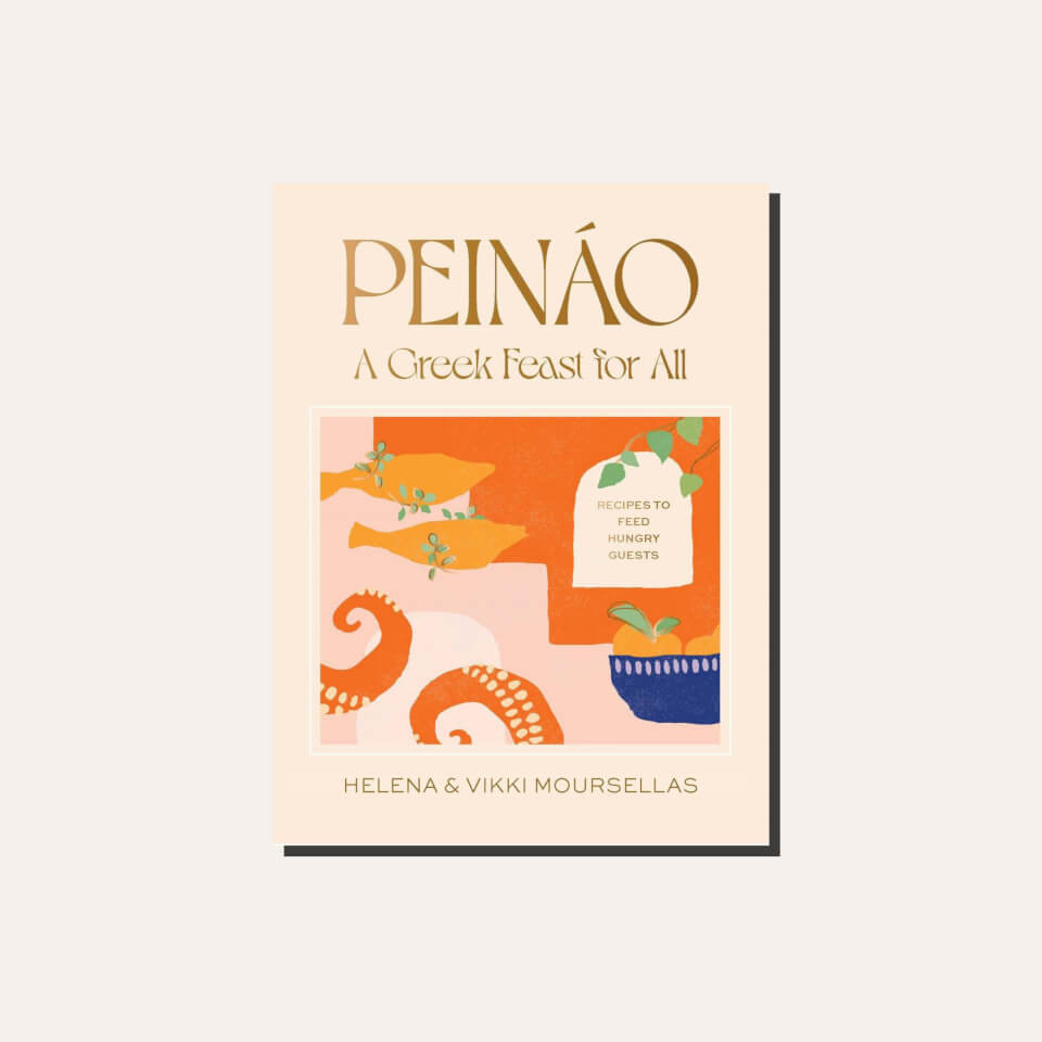 A cookbook cover in a light tan frame