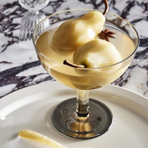 poached pears in bowl