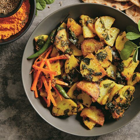 A bowl of Indian Aloo Methi