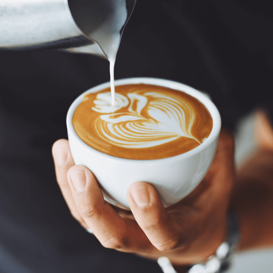 cup of coffee with steamed milk