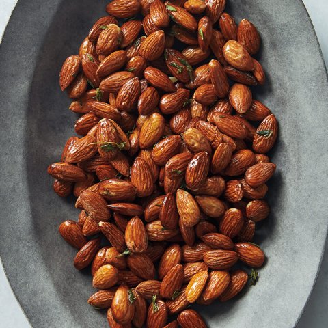 A dish of roasted almonds