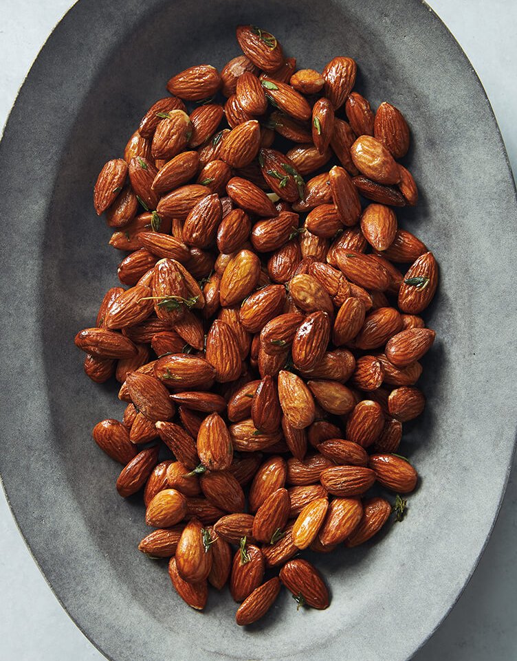 A dish of roasted almonds