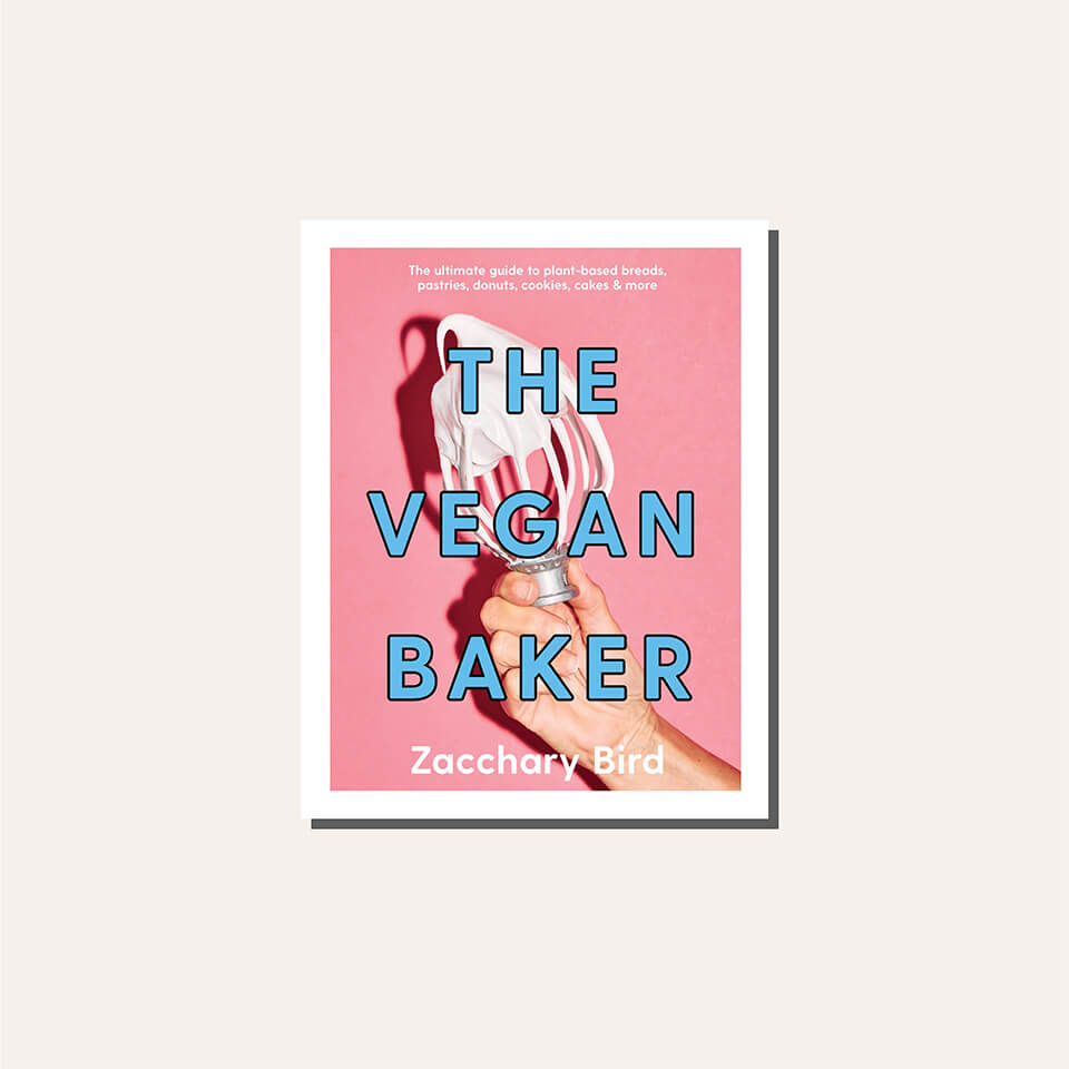 A book cover in a light tan frame