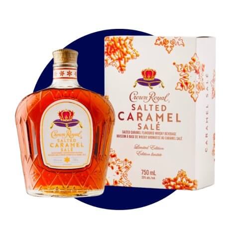 A bottle of Crown Royal whiskey next to a white box.