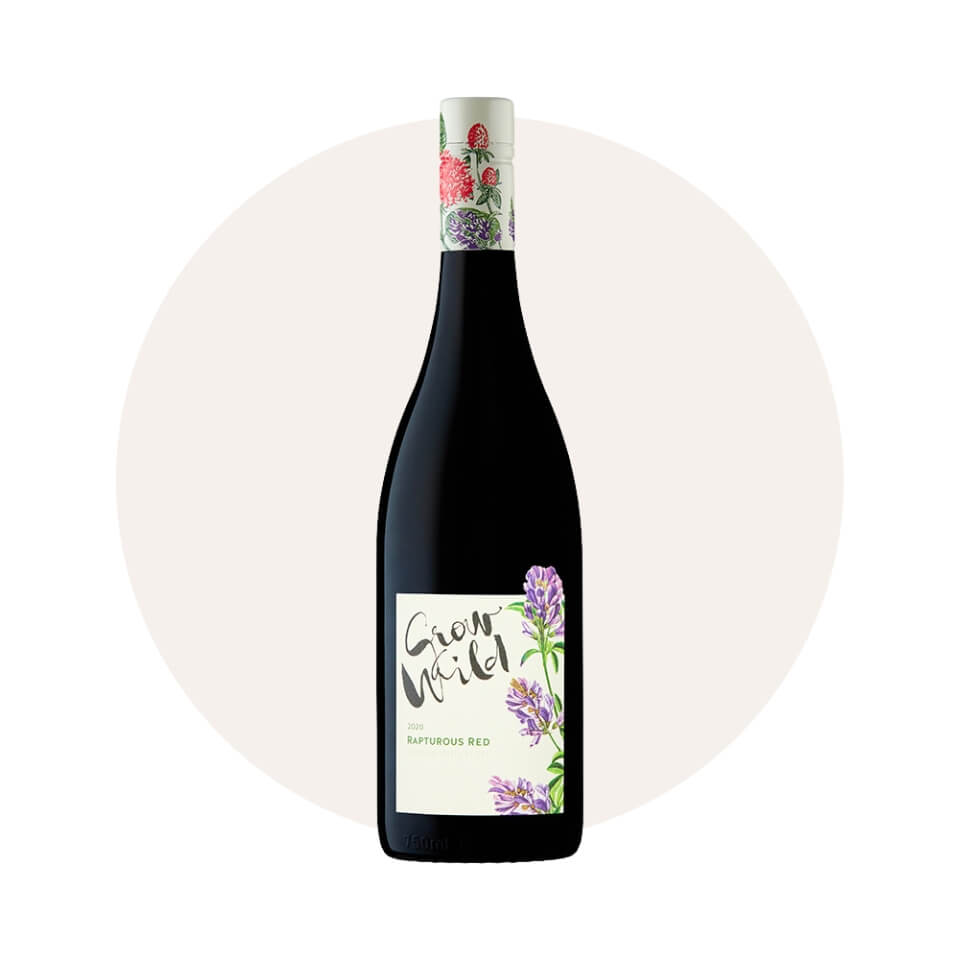 A bottle of red wine over a cream-coloured circle