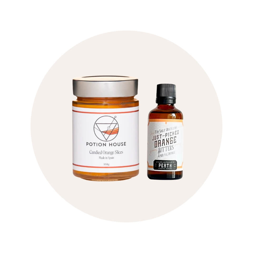 Two containers with white and orange labels in a cream-coloured circle