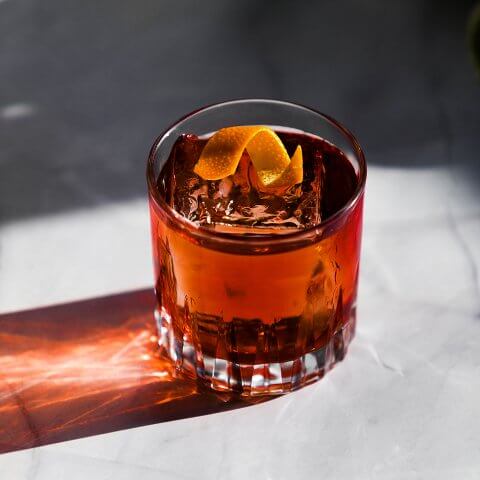 A negroni on a marble surface
