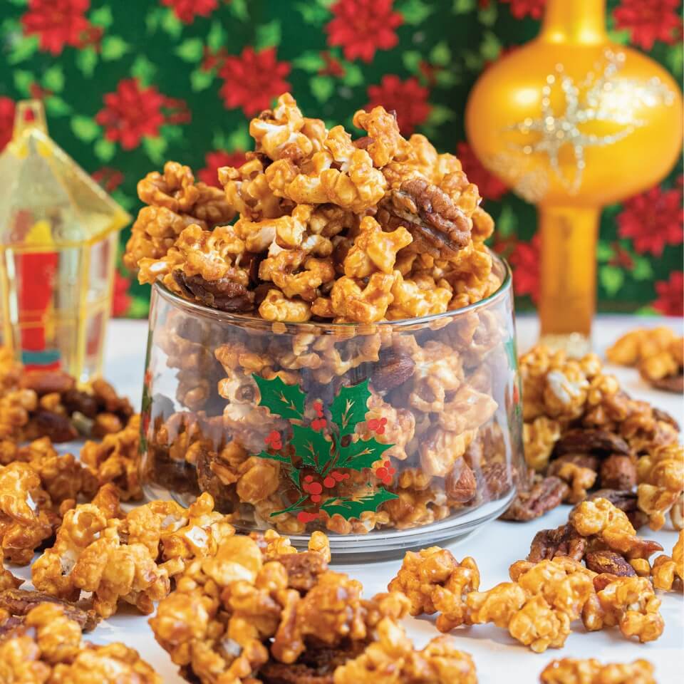 dish of caramel popcorn in a christmas setting