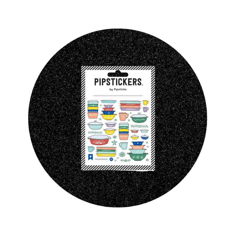 A sheet of Pyrex dishware stickers in a sparkly black circle