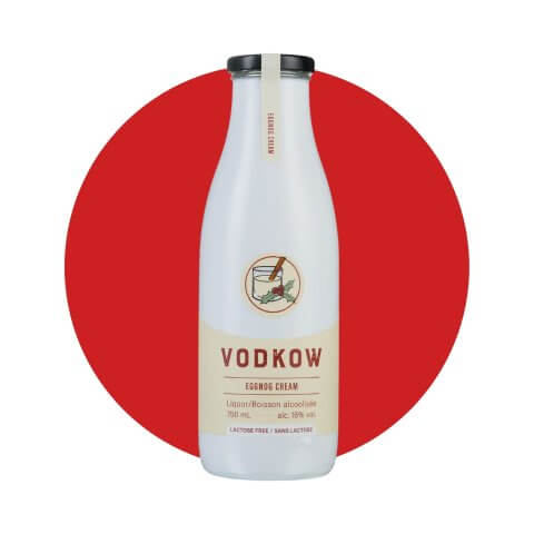 A white milk bottle with a black lid and tan label.