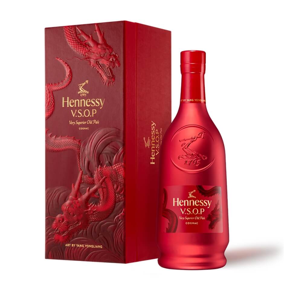 A red Hennessy bottle and a box with dragons on it