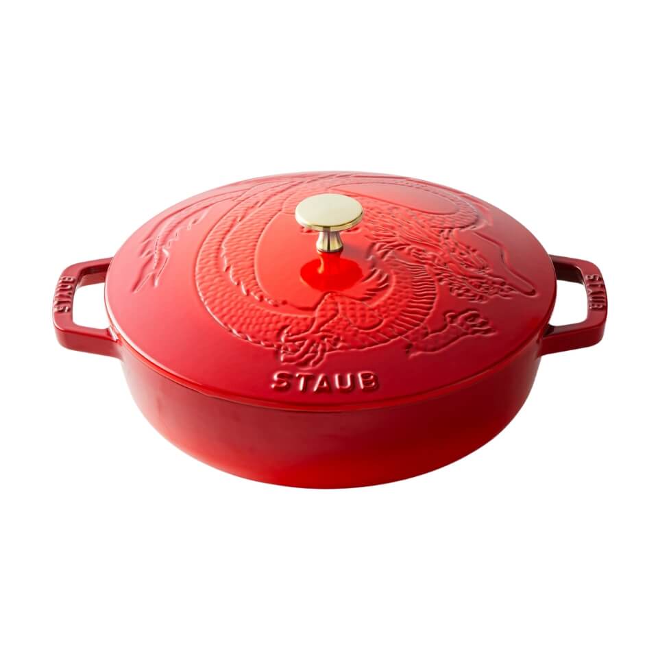 A red braiser with a dragon lid engraved in the lid
