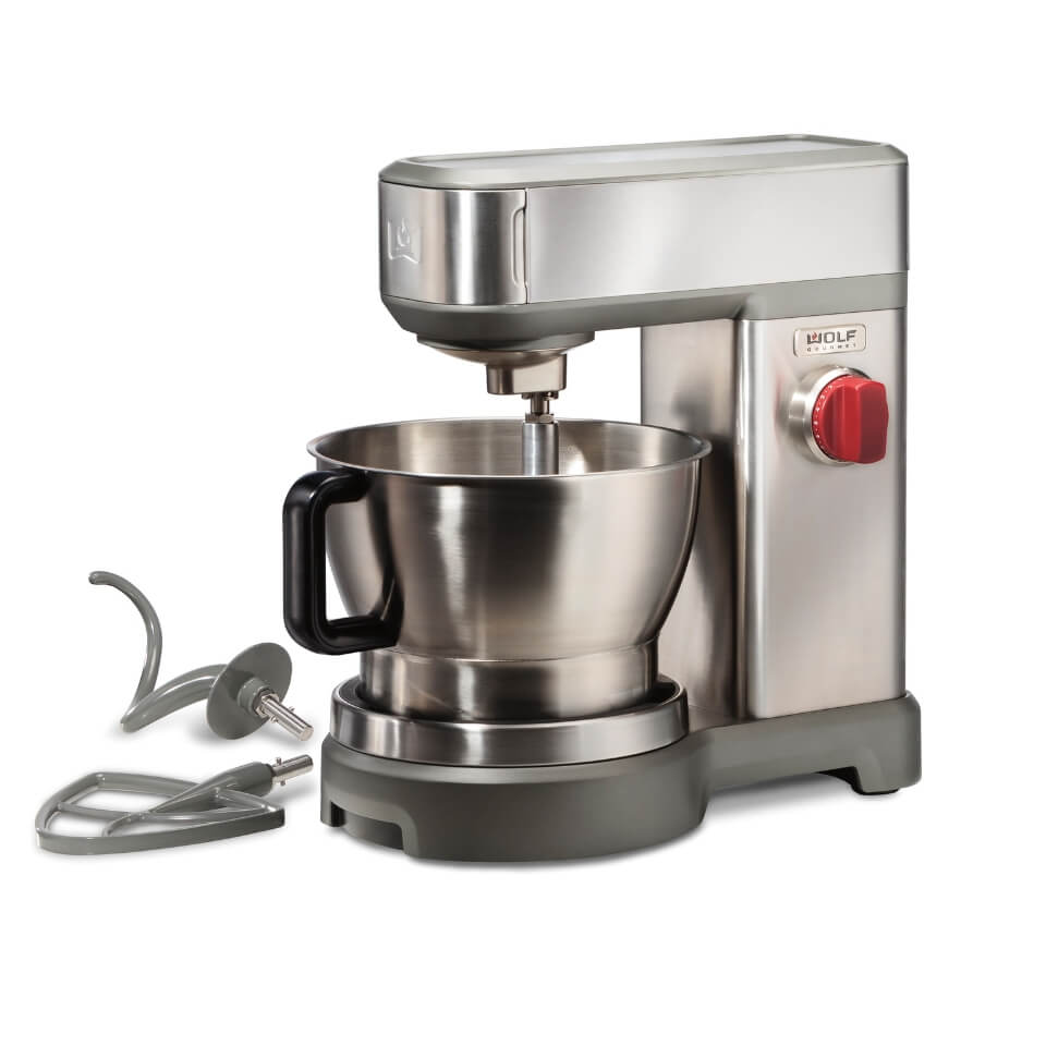 A stainless steel stand mixer with a red dial