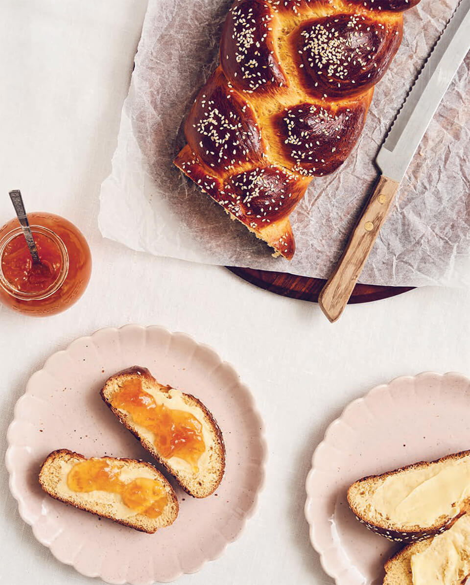 Slices of Greek Easter bread spread with marmalade