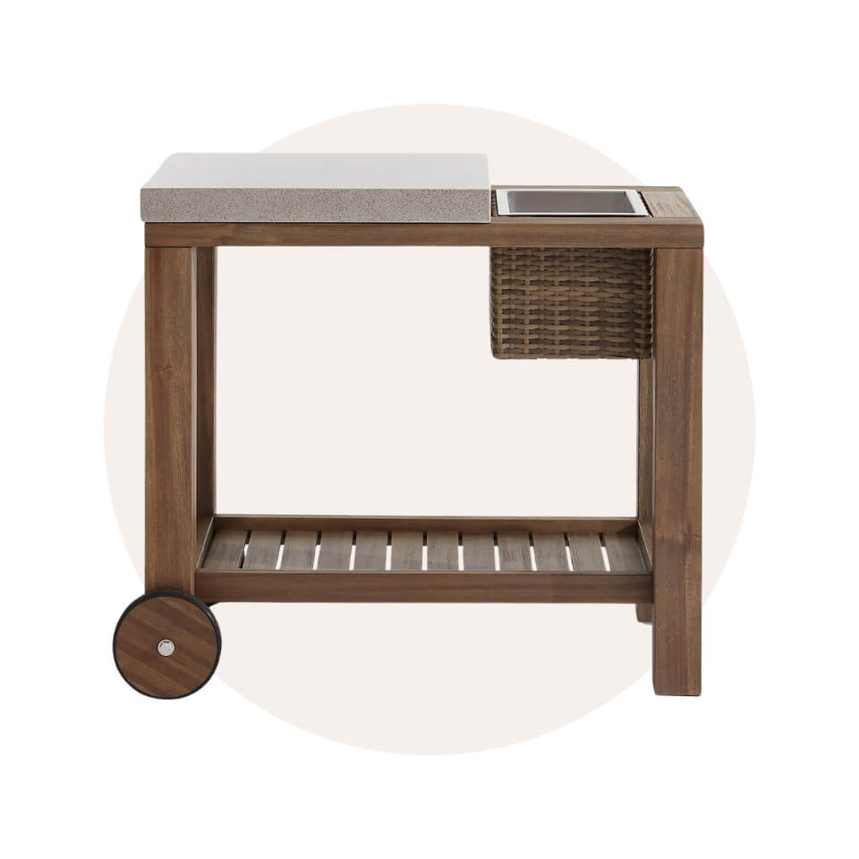 A wooden bar cart over a cream-coloured circle