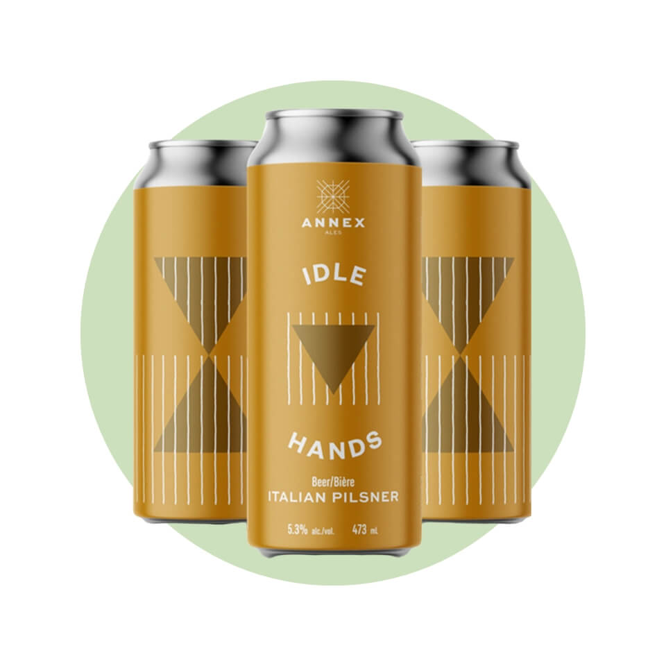 Three tall cans of beer with brown labels over a light green circle