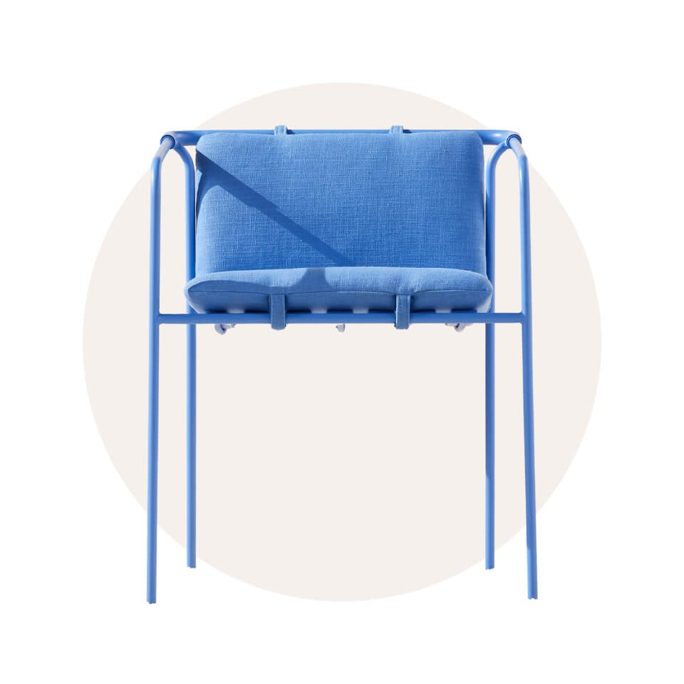 A blue chair over a cream-coloured circle