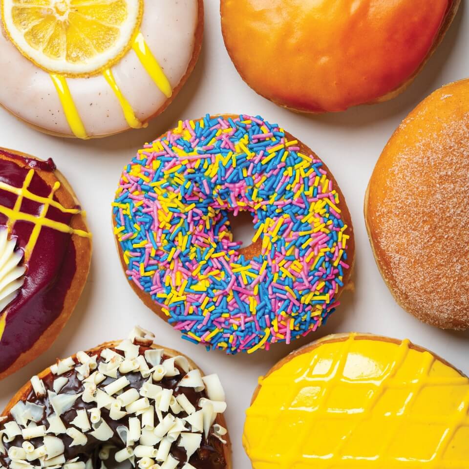 A closeup shot of various kinds of doughnuts