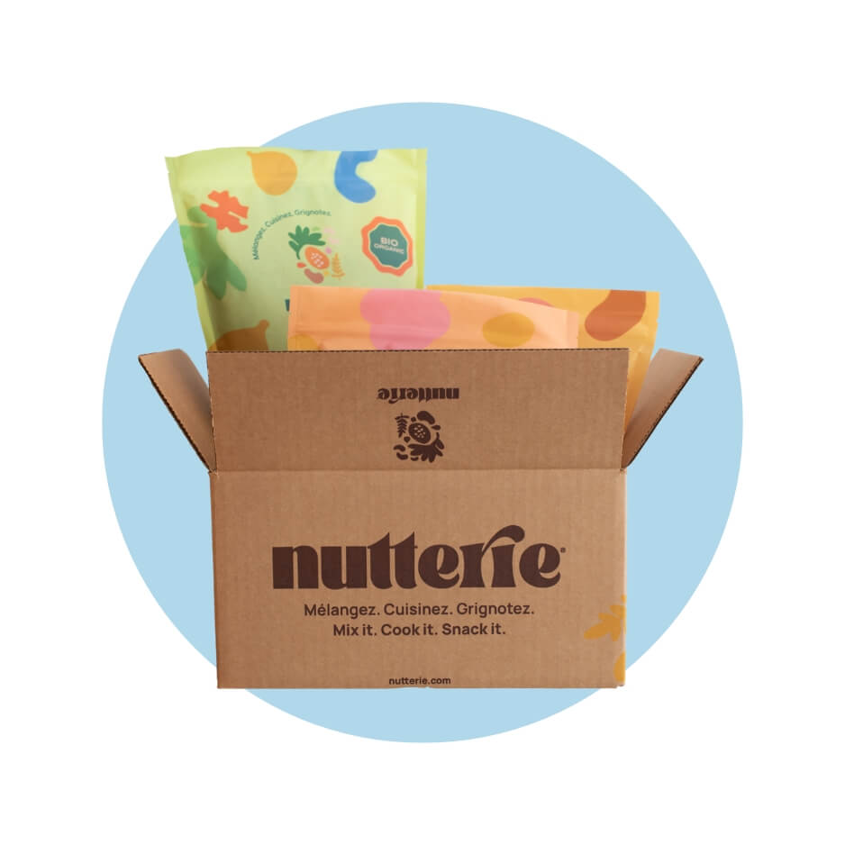 A cardboard box with packages in it over a light blue circle